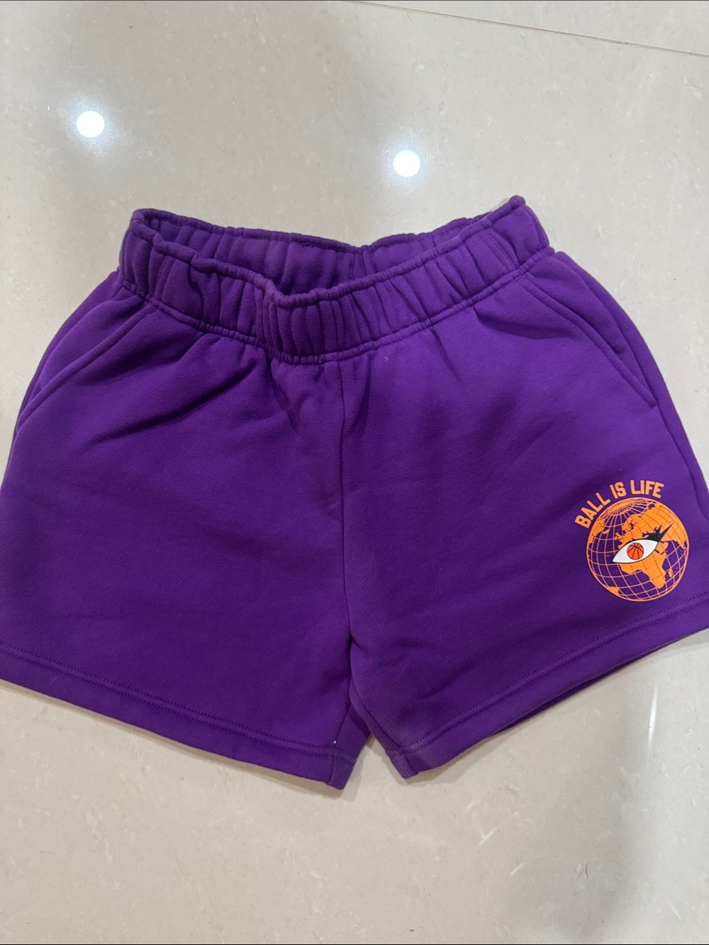 Melody Ehsani Purple Women's Athletic Shorts with Orange Logo